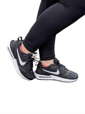Nike Black and White Athletic Sneakers with Red Sock Detail